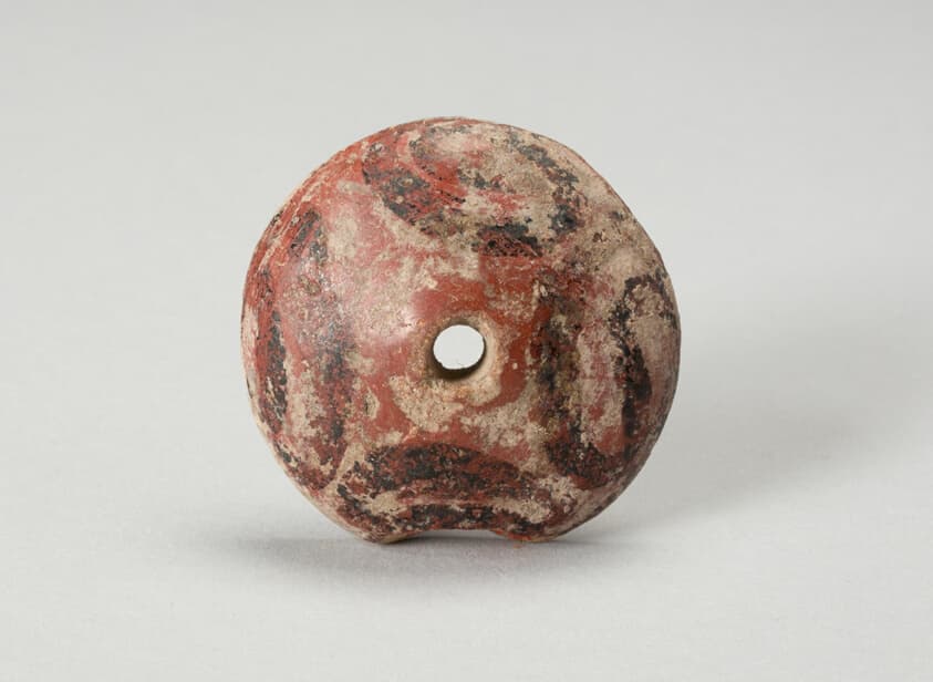 Ear Ornament or Spindle Whorl with Modeled Design