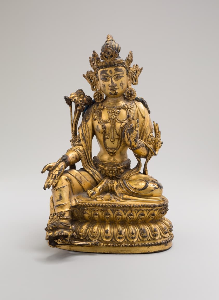 Green Tara, Seated in Pose of Royal Ease (Lalitasana), with Lotus Stalks on Right Shoulder and Hands in Gestures of Reasoning (Vitarkamudra) and Gift Conferring (Varadamudra)