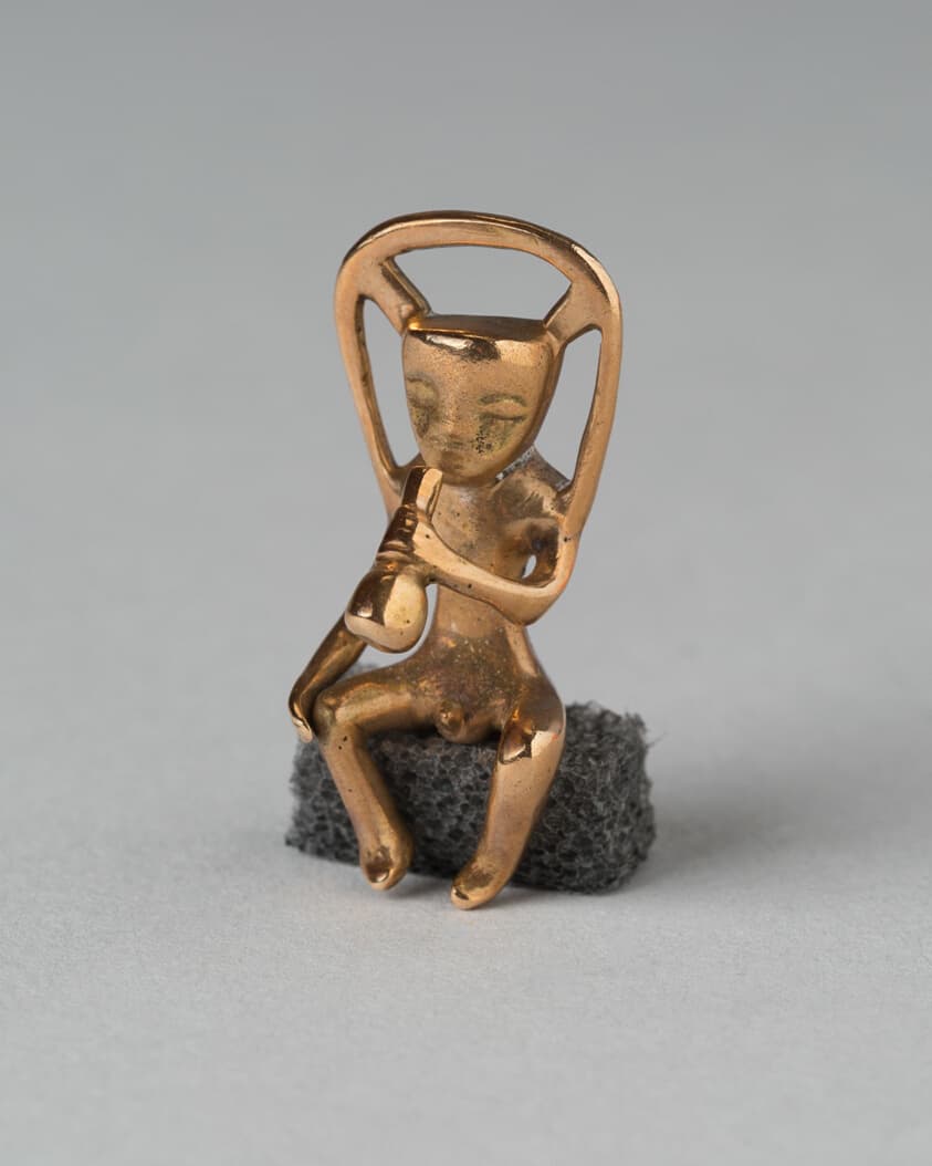 Pendant in the Form of a Seated Musician