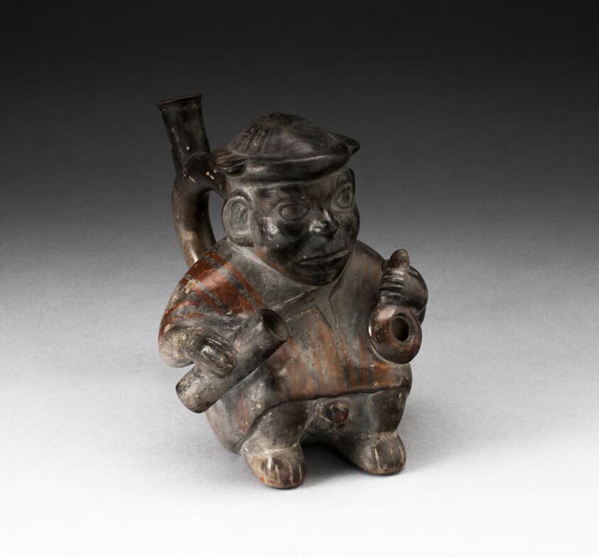 Handle Spout Vessel in the Form of a Figure Holding Corn Popper and Rolled Mat