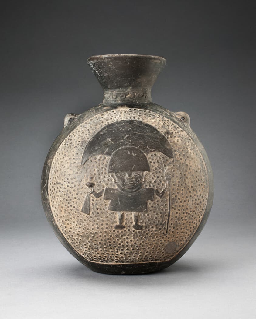 Jar with Relief of Standing Figure with Crescent Headdress, Holding Ritual Objects