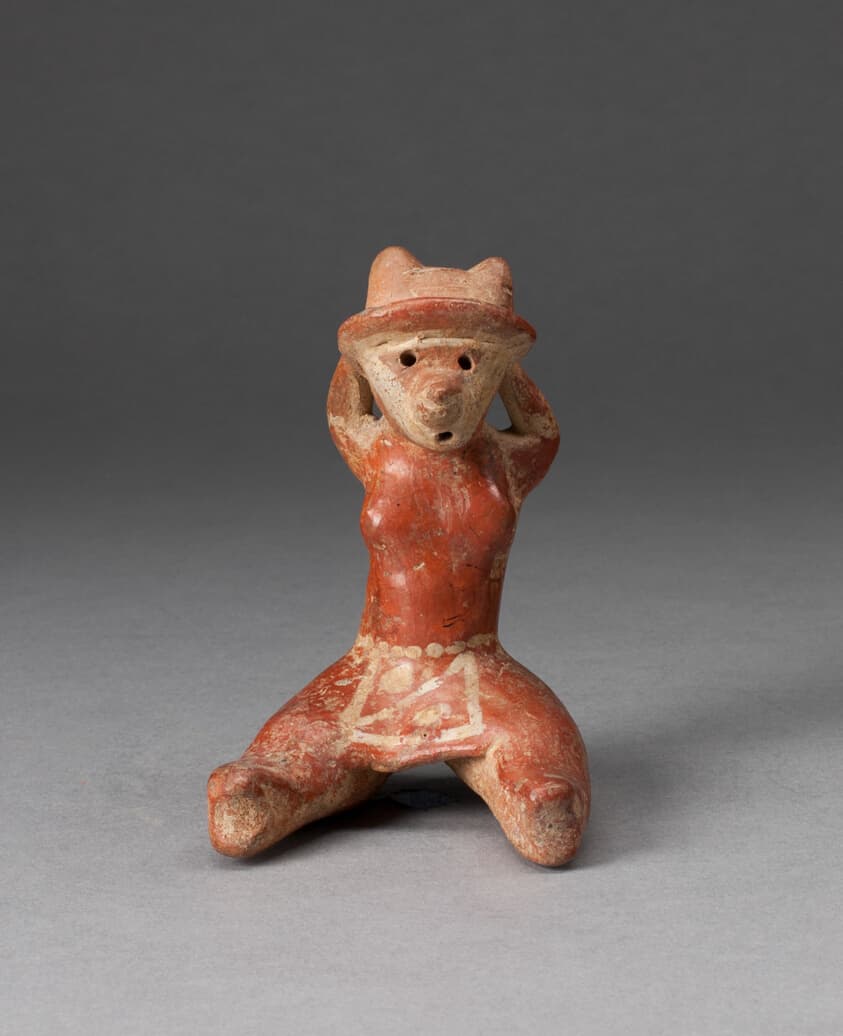 Miniature Seated Figurine with Arms Held Behind the Head